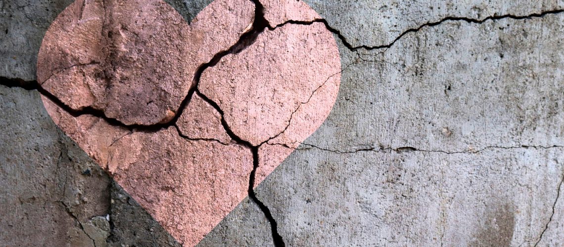 broken heart betrayal on concrete art